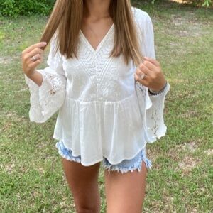 White bell sleeve blouse